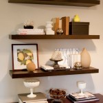 Tidy Oak Floating Shelves IKEA on White Painted Wall above Solid Teak Cabinet