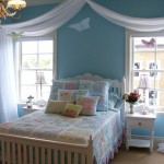 Traditional Blue Interior Design Ideas for Girl Bedroom with White Bed and Colorful Quilt beside Blue Wall