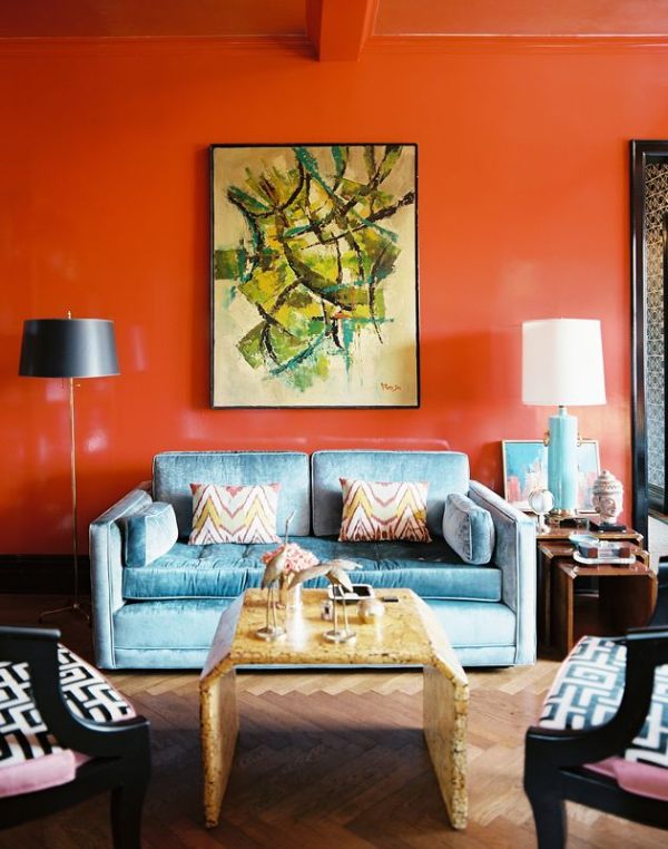 Unique Orange Painted Wall and Abstract Oil Painting in Bright Living Room Color Ideas with Blue Sofa
