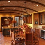 Wonderful Tuscan Kitchen Design Ideas with Wide Island and Classic Stools near Open Round Dining Area