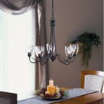 Lowes Glass Chandelier Shades above Wooden Dining Room Table with Centerpieces at Traditional House Concept