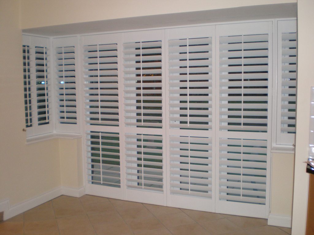 Splendid White Models for Interior Window Shutters Design Suited to Cream Painted Wall