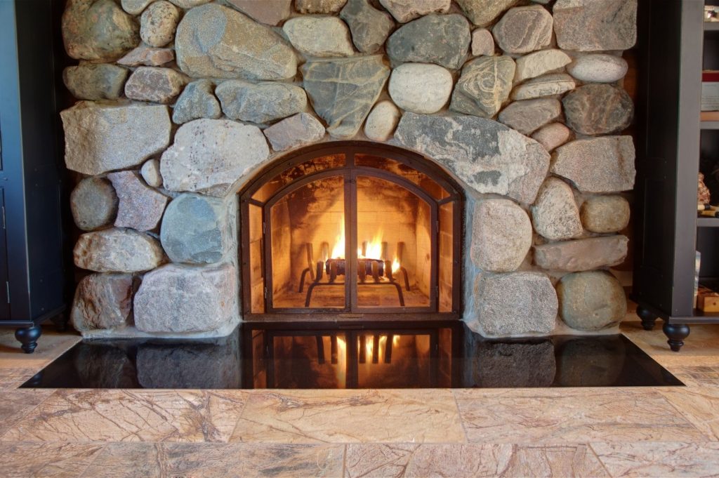 Superb Custom Fireplace Doors Design with Stones Wall Ideas for Your Fireplace Schemes