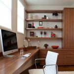 Fascinating White Chair and Long Wooden Desk near Oak Cabinets in Modern Home Office Decorating