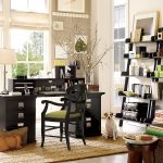 Interesting Green Lather on Dark Armchair facing Black Working Desk in Bright Home Office Decorating