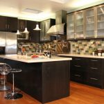 Sensational Acrylic Stools and Black Island on Oak Flooring inside Open Kitchen with Most Popular IKEA Kitchen Cabinets