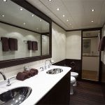 Stylish Bathroom using Home Ideas Decorating with Black Vanity and Glossy Sinks under Long Mirror