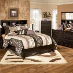 Alluring Oak Dressers and Wide Bed inside Unique Bedroom Decorate Room Ideas with Hardwood Flooring