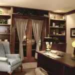 Classic Grey Wingchair facing Oak Desk inside Home Office using Great Interior Design Ideas