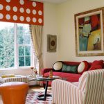 Inspiring Decorate Room Ideas for Sitting Space with Fluffy Sofas and Round Orange Ottoman