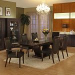 Inspiring Dining Room Interior Design with Dark Chairs and Long Table under Crystal Chandelier