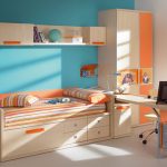 Modern Boy Bedroom using Minimalist Decorate Room Ideas with Orange Bedding and Wooden Computer Table