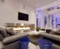 Sensational Blue Acrylic Side Tables and Grey Sofas in Modern Ideas for Decorating Living Room with Long Fireplace