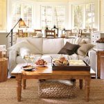 Traditional Home Decoration Inspiration with Wooden Table and White Sofa on Wicker Carpet