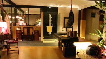 Wide Asian Interior Design for Bathroom with Glass Shower Space and Artistic Ceiling Lamps