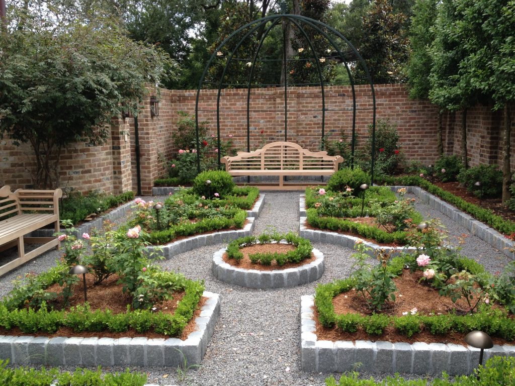 Wonderful Gardens Decorating Ideas with Pebble Pathway and Wooden Bench near Brick Wall