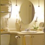 Calm Wall paint and Circle  Bathroom Mirror Desaign Ideas above Small White Cabinet Color