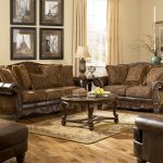 Natural Brown Sofa in Antique Living Room Ideas with Calm Wall and Wooden Floor