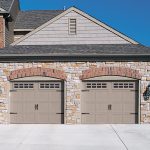Appealing Design Ideas  Two Carriage Style garage Doors on Brick Wall with Grey Color