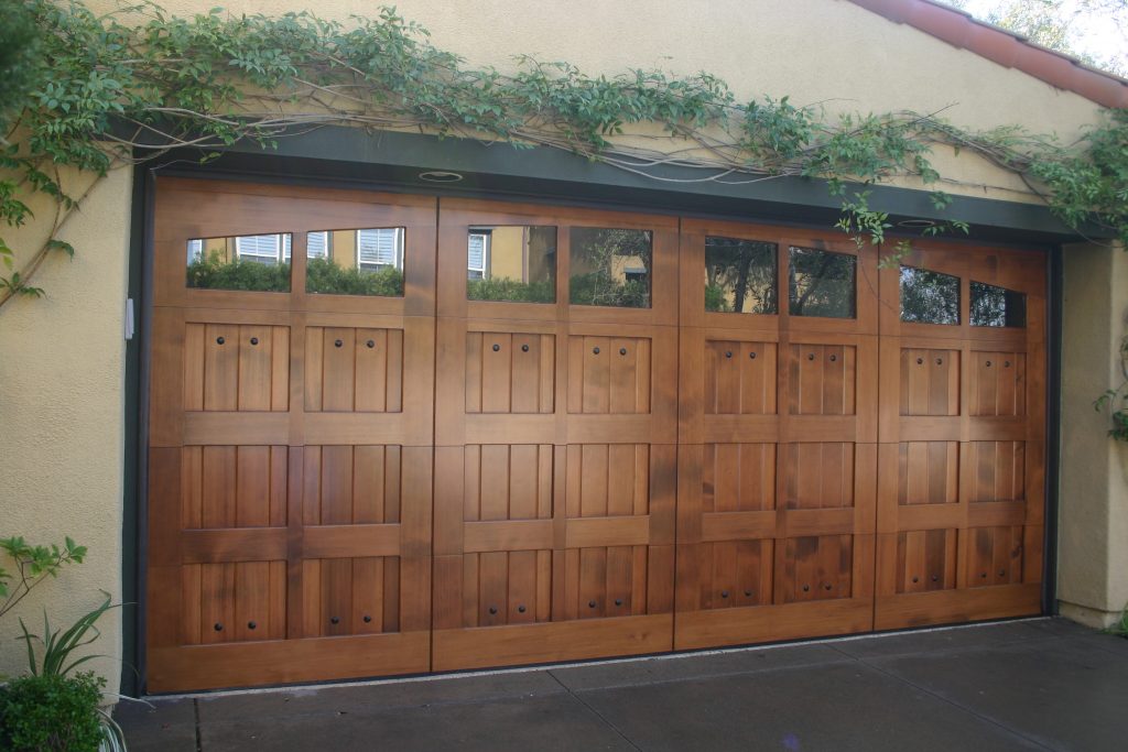 Big Carriage Style Garage Doors with Wood Materials and Simple Downlight plus Dark Floor