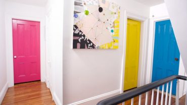 Bright Door Color Ideas with Cute Painting on White Wall Paint plus Wooden Floor