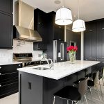 Charming Design of Kitchen Cabinet Color Ideas in Black using Shiny White Countertop Design