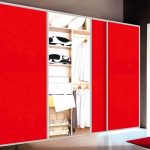 Classy Big Sliding Closet Doors with Red Color Accent and Tiny White Architrave