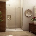 Delicate Bathroom Furniture with Wooden Cabinet and Wall Lamp plus Alumax Shower Door
