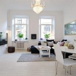 Enticing Swedish Home Design Ideas with Black Sofa Bed also White Coffee Table plus Glass Chandelier