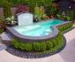 Fabulous Water Fountain for Small Swimming Pools Designs with Black Gravels closed Fresh Plant