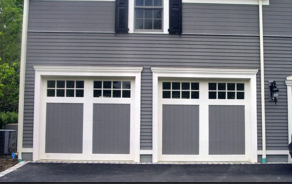 Gray Wall fit to Carriage Style Garage Doors with Small Wall Lamp and Cute Window