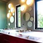 Lovely Ambience for bright Bathroom Idea with Circle Mirror Accent on Large Wall