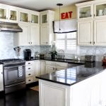 Outstanding Decor of Lowes Kitchen Design with Cool White Cabinet using Black Top