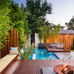 Rustic Wood Floor and Fence right for Small Swimming Pools Designs with Gray Sofa