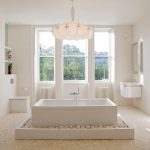 Stylish Bathtub under Nice Lighting plus Simple Sink fit to Classic Luxury Bathrooms