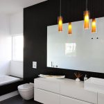 Uncommon Chandelier near Big Mirror on Black Wall fit to Modern Minimalist Bathroom Designs
