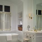 White Bathtub front Towels Storage plus Big Mirror closed Sink for Classic Luxury Bathrooms