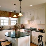 Outstanding Small Kitchen with White Cupboards and Modern Kitchen Islands Applying Blaack Marble Countertop
