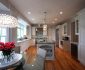 Outstanding Traditional Kitchen with Modern Kitchen Lighting Furnished with Island Applying Marble Countertop