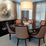 Captivating Modern Dining Room Tables Applying Round Design Plus Furnished with Brown Armless Chairs