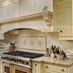 Contemporary Kitchen Installed on Hardwood Laminate Flooring and Applying Tiled Backsplash Designs also Granite Countertop