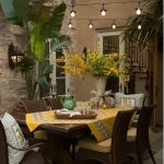 Fabulous Plants on Pot Enhancing Outdoor Living Spaces with Charming Centerpiece on Woode Table