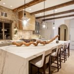 Glorious Kitchen Island Combined with Remarkable Backsplash Ideas Illuminated by Trio Pendant Lamps