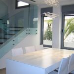 Marvelous Modern Dining Room Tables Applying White Color Furnished with Crystalist Chandelier and Chairs