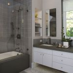 Affordable Bathroom in Lavish Style Employing Dark Grey Tile as Shower Wall with White Bathtub