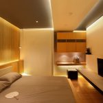 Flat Bedroom INterior with Yellow Recessed Lighting Fixture Making the Glowing Sensation