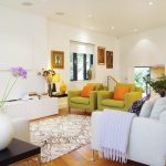 (3) White Sofas and Green Sofas near White Cabinets for Best Living Room Design 2016 with Hardwood Flooring