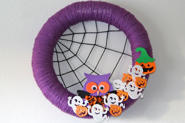 yarn spider themed wreath